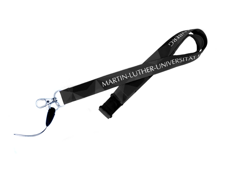 Das Schlüsselband „Martin-Luther-Universität“ ist schwarz mit silbernem Clip und Band, trägt den Schriftzug MARTIN-LUTHER-UNIVERSITÄT in Weiß, dezente geometrische Muster und ist locker geschlungen auf weißem Untergrund abgebildet.