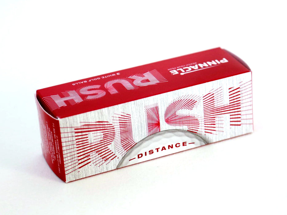 Eine rechteckige rot-weiße Schachtel mit der Aufschrift „Golfball ‚hallesaale*‘“ weist kräftige rote Strahlen und eine halbrunde Aussparung auf und enthält laut Verpackung 5 weiße Golfbälle.