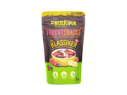 Die Fruchtsnacks „Der Klassiker“ kommen im Standbeutel mit farbenfroher Verpackung und präsentieren gefriergetrocknete Früchte in einer Schale – ideal als Snack oder Müsli-Topping. Der deutsche Text betont die natürlichen, veganen und glutenfreien Eigenschaften.